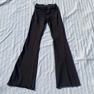 O2 dark brown flares with frayed hem. Size 24. 34in inseam EUC